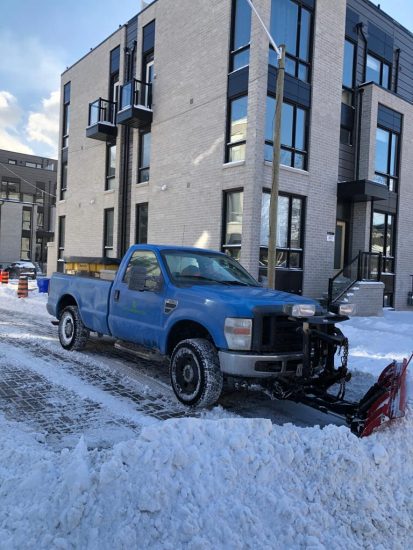 Commercial Snow Removal Truck in Action.